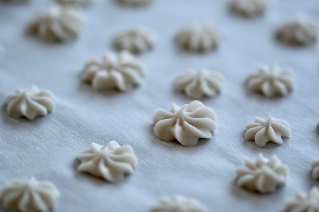 dairy-free butter mints drying on parchment paper