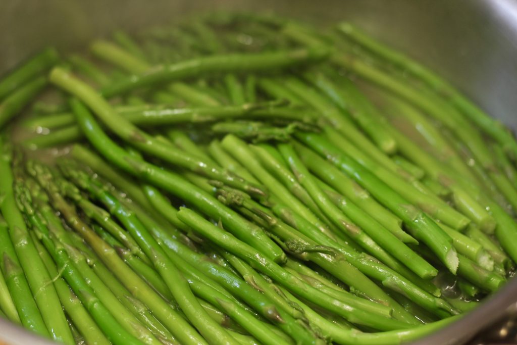 asparagus after 15 minutes of cooking in stainless steel pan
